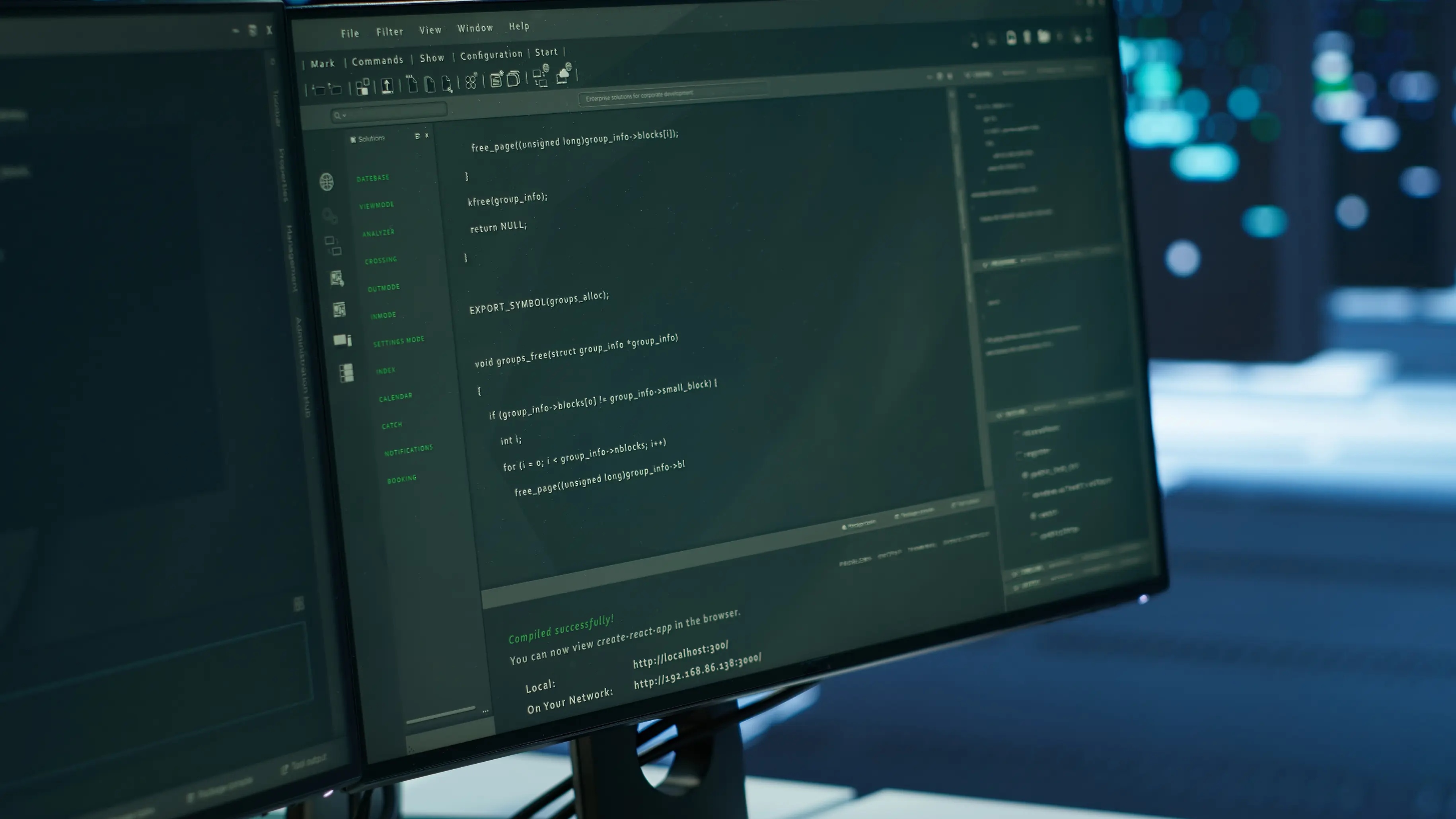 Close-up of code on a monitor in a server room